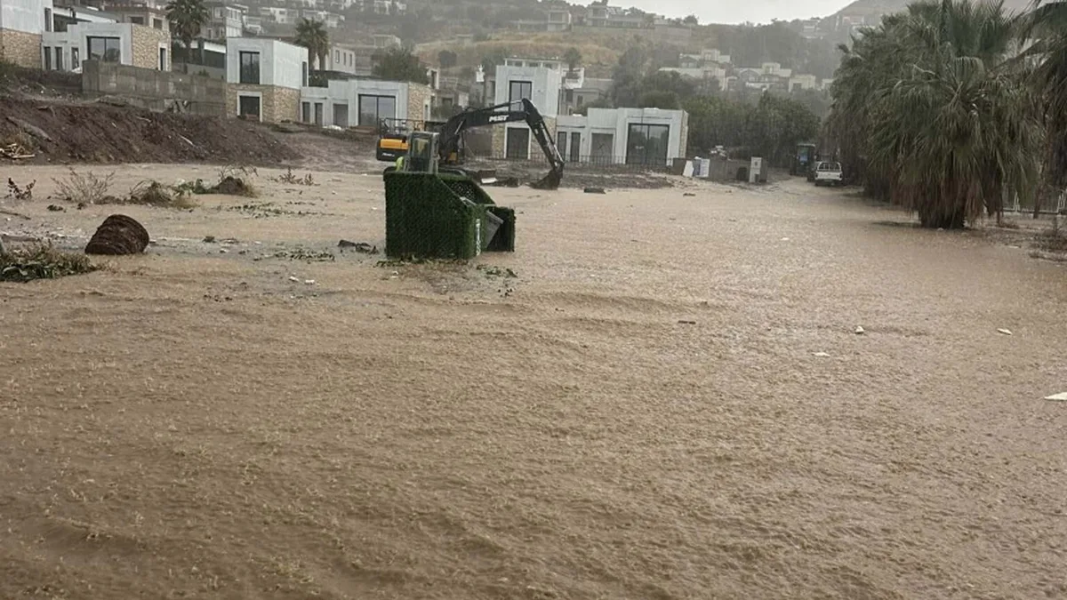 Heavy Rain Floods Businesses and Closes Road in Bodrum