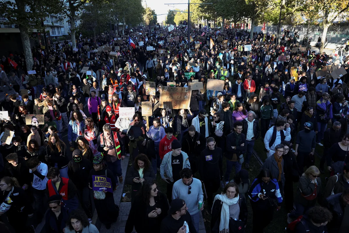 France protests draw 320,000 by official count and nearly 500,000 by unions